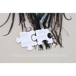 Törhető  puzzle alakú ezüst medál 